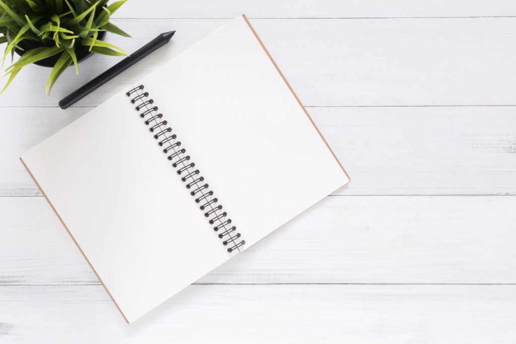Use a spiral notebook instead of a legal pad